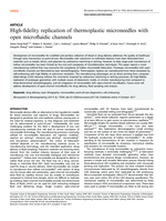 High-fidelity replication of thermoplastic microneedles with open microfluidic channels
