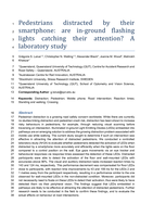 Pedestrians distracted by their smartphone: Are in-ground flashing lights catching their attention? A laboratory study